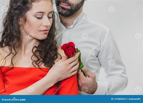 A Young Handsome Man Gently Covers His Beautiful Wife During This