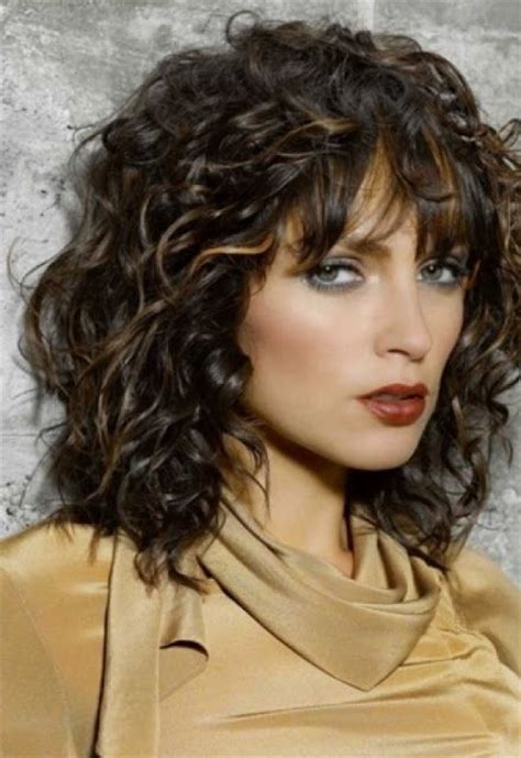 The wavy curls rapidly advance the style of this pixie cut. 46 best images about Haircuts for thick, wavy, curly ...