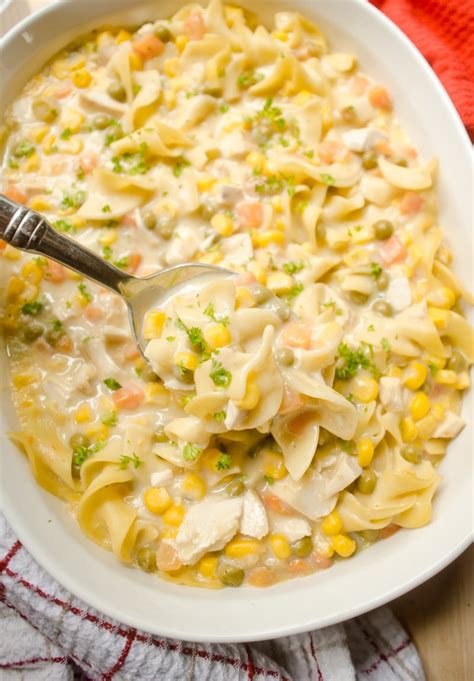 Stir the dijon mustard into the creamy chicken, and then combine the sauce. Creamy Chicken Noodle Casserole - A Grande Life