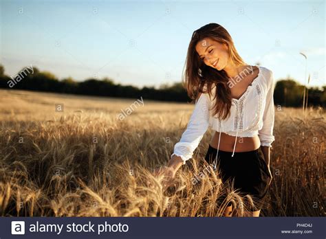 A space to harness great ideas and bring them to life with the right imagery. Young beautiful woman spending time in nature Stock Photo ...