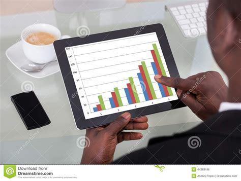 Businessman Analyzing Graph Stock Photo - Image of black, holding: 44389196
