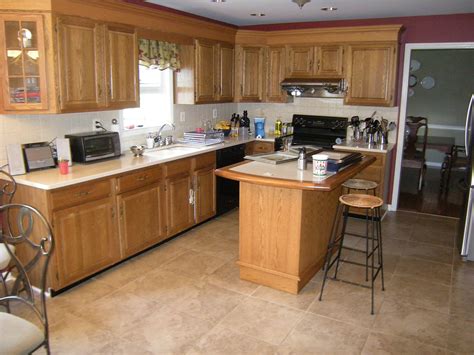 The good thing is that cabinets fastened to the wall can usually be taken off without any damage, meaning you can reuse the cabinets if. Kitchen Remodel vs. Facelift (With images) | Kitchen remodel, Colonial kitchen remodel, Cheap ...