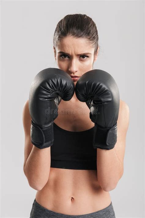 photo of beautiful brunette sportswoman training in boxing glove stock image image of exercise