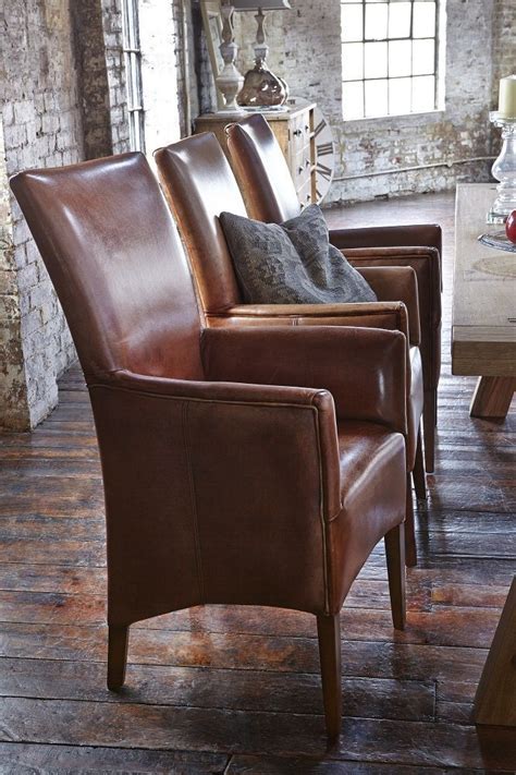 If anyone is going to split hairs about the difference between an arm and a lounge chair, it's us. Add a sophisticated look to your dining room with the ...