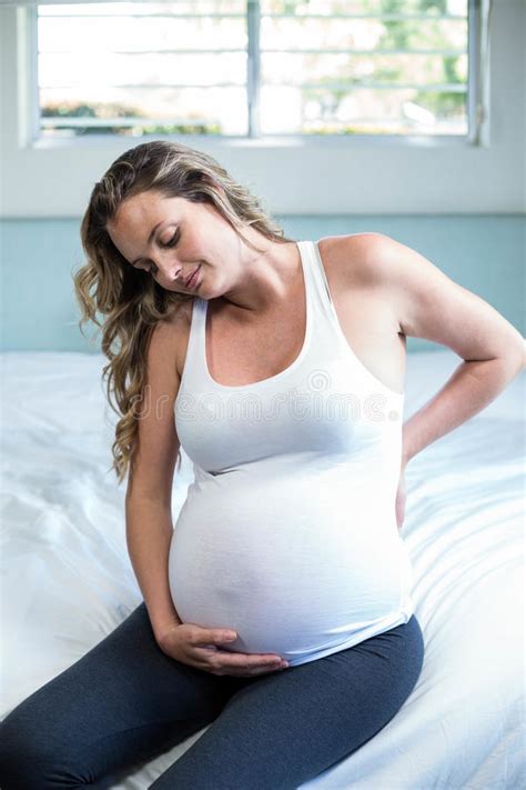 Pregnant Woman With Back Pain Sitting Stock Photo Image Of Caucasian