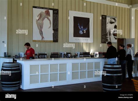 Visitors Enjoy A Glass Of Wine At The Bedell Winery At Cutchogue North