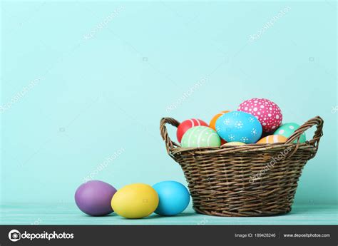 Colorful Easter Eggs Basket Wooden Table — Stock Photo © 5seconds