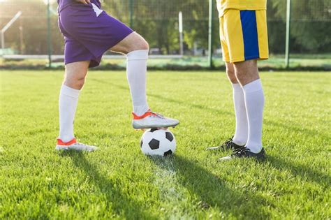 Free Photo Amateur Football Concept With Legs Of Players