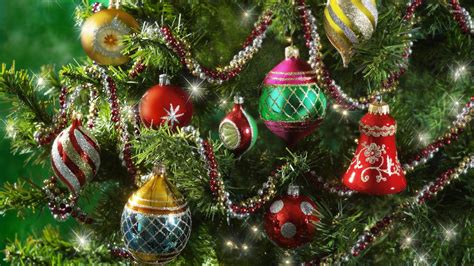 Colorful Baubles In The Sparkly Christmas Tree Wallpaper Holiday