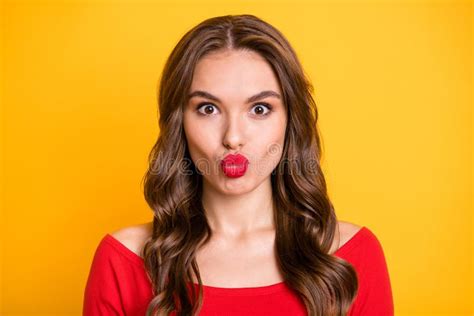 Photo Portrait Of Funky Brunette Sending Air Kiss In Red Top Isolated