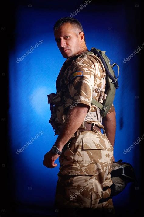 Young Man In Military Uniform — Stock Photo © Bereta 9038477