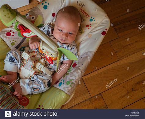 Baby In Toy Bouncer Stock Photo Alamy
