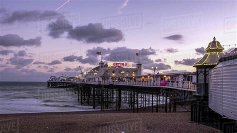 A Sunset Shot Of Brighton Pier At Brighton Beach England Stock Photo