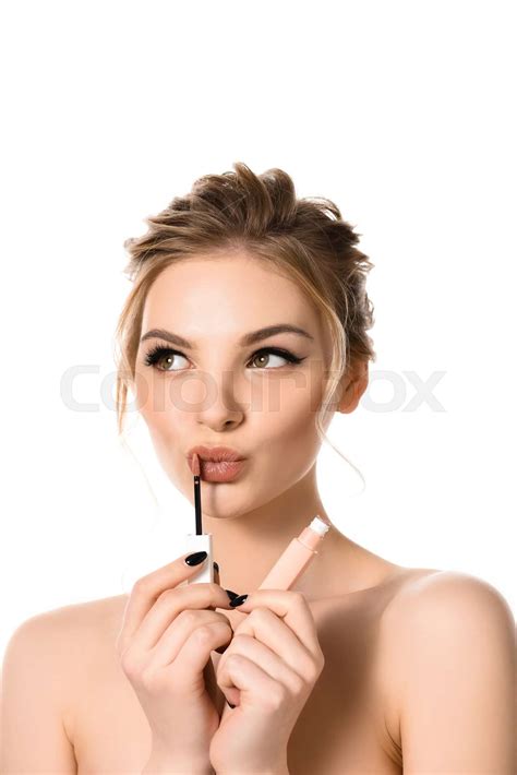 Naked Beautiful Blonde Woman With Makeup And Black Nails Applying Beige