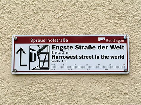The width of the street in the german town of reutlingen is only 32 cm. Spreuerhofstrasse - World's Narrowest Street - German Culture