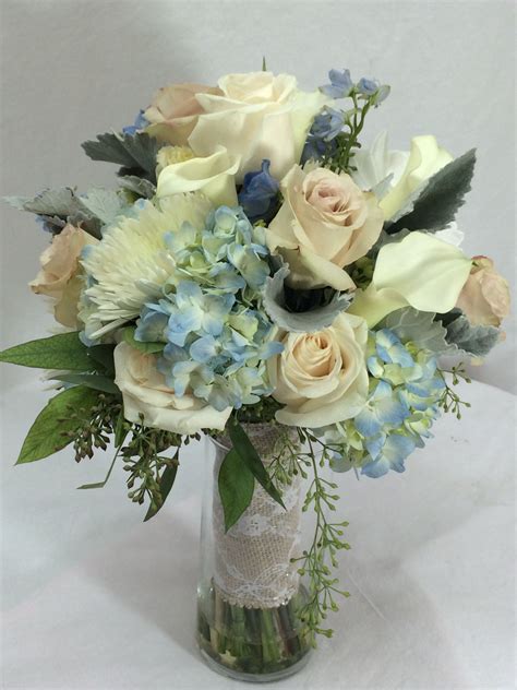Check spelling or type a new query. Sweet bridal bouquet of blue hydrangea, Quicksand roses ...