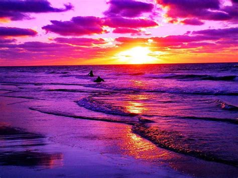 Pink, purple and yellow beautiful sunset with the visible silhouetted islands in the background with copyspace. Pin on BY THE SEA & SAND