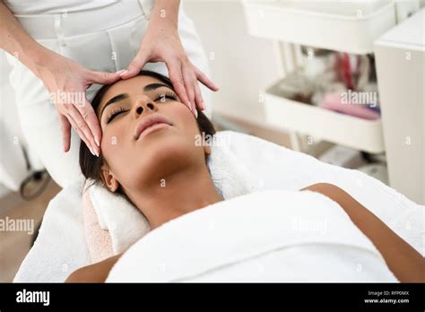 Arab Woman Receiving Head Massage In Spa Wellness Center Beauty And