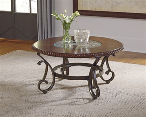 Small tables and console, the accessory that completes la mise en scene of the. Round Traditional Cocktail Table in Reddish Brown | Mathis ...