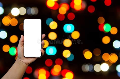 Hand Holding Phone Mockup Image Blank Screen For Advertising Text In