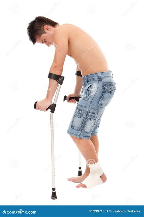 Young Man With Crutches Stock Image Image 23971351