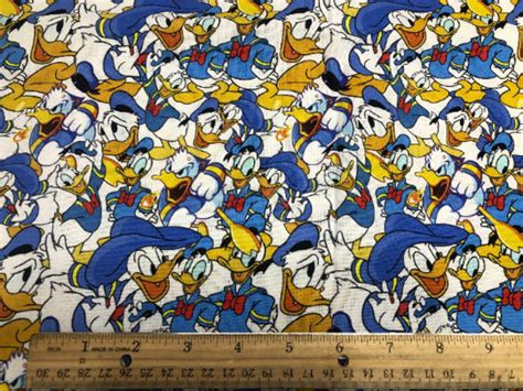 Donald Duck Collage 100 Cotton Fabric By The Yard Disney Etsy