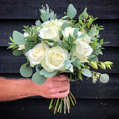 A Bridal Bouquet Of Rustic Fresh White Roses The Farmhouse At