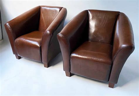 Find the best armchairs at zanui. ARMCHAIRS, a pair, tub, mid brown leather with curved ...