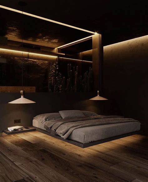 A Large Bed Sitting On Top Of A Wooden Floor Next To A Wall Mounted Mirror