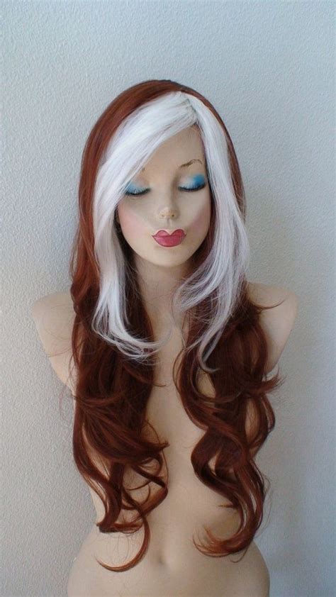 This hairstyle would have been a regular pixie cut with a buzzed under shade were it not for the vivid shade of green that has been used to give it that stylish pokémon touch. Cosplay wig. Auburn hair White bangs wavy hairstyle ...