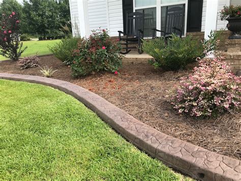 We called several contractors in the area and warner's lawn care was the only company who would come out to help. Concrete Edging | Lily's Landscaping
