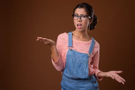 Premium Photo Portrait Of Beautiful Nerd Woman With Eyeglasses