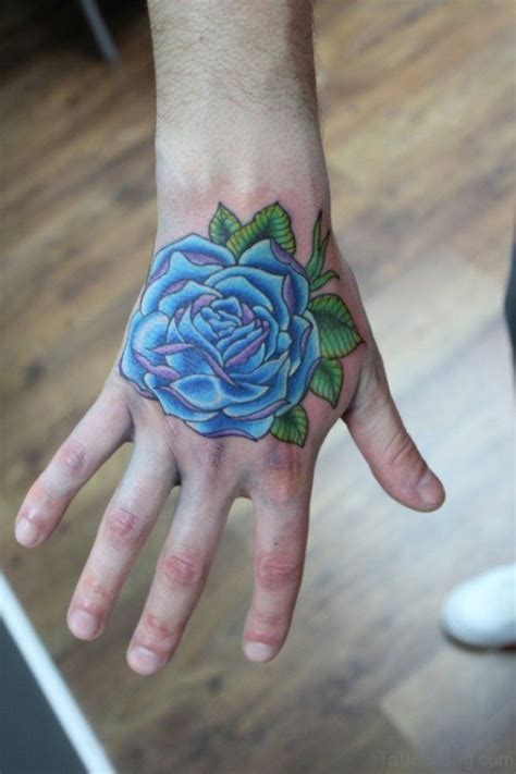 30 Fantastic Blue Rose Tattoos On Hand Tattoo Designs
