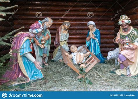 nativity scene with figurines of jesus mary joseph sheep and wise men stock image image of