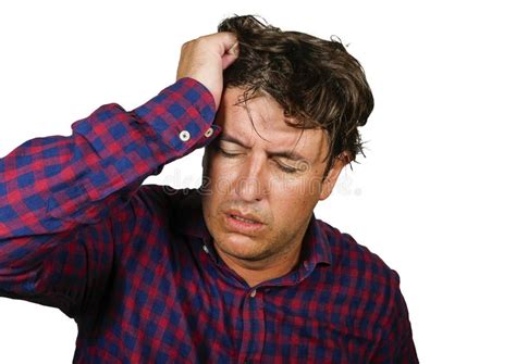 Stressed And Overwhelmed 30s Or 40s White Man Holding Head With Hands