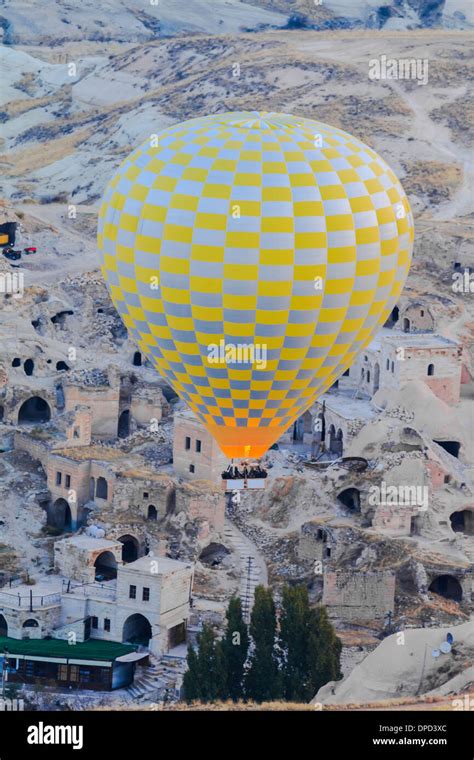Hot Air Balloon Flying Over Goreme In Cappadocia Turkey Stock Photo