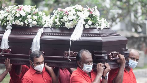 Thousands Pay Their Respects At Funeral Of Veteran Sri Lankan