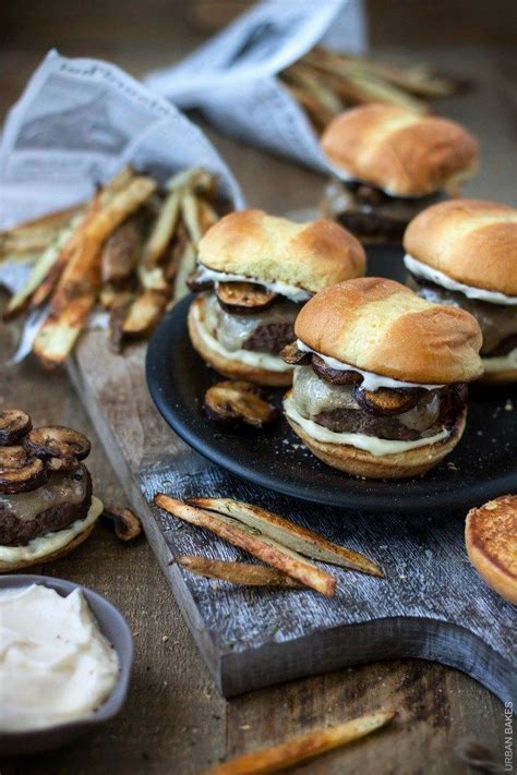 Seasoned Burger Sliders With Melty Swiss Cheese Between 2 Buttered