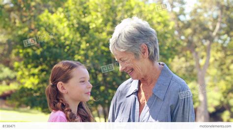 Happy Grandmother Hugging Her Granddaughter Lizenzfreie Videos 8130471