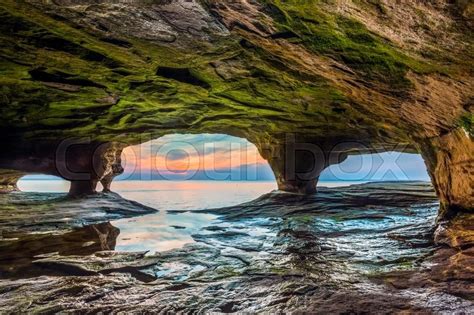 A Colorful Sunset Is Viewed Through The Portals Of A Lake Superior Sea