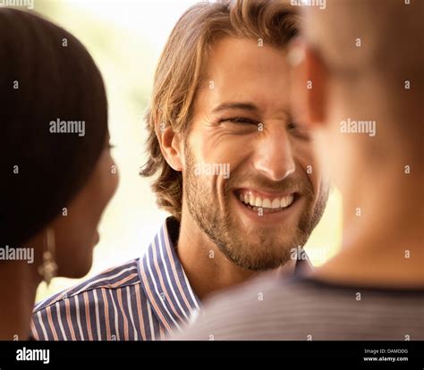 Friends Talking Outdoors Stock Photo Alamy