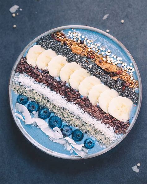 Blue Spirulina Bowl With Banana Blueberry Coconut Cacao Nibs And