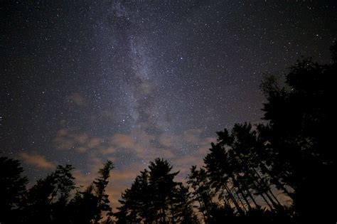 Black Mountains Under The Stars At Nighttime · Free Stock Photo