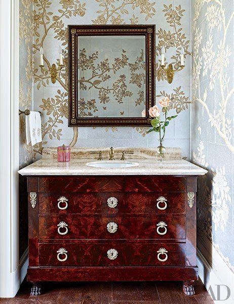 A Vanity Made From A Directoire Commode Furnishes The Powder Room Of A