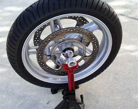 Static balance a wide variety of motorcycle wheels from harleys to dirt bikes and true spoked tires with the black widow wheel. Suzuki Motorcycle Wheel Balancer