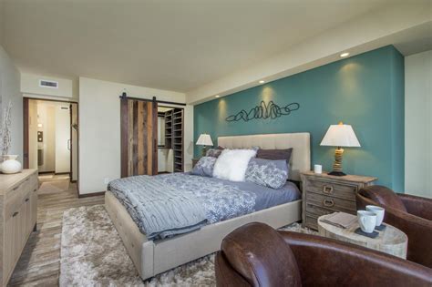 Contemporary Master Bedroom With Blue Accent Wall Hgtv
