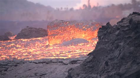 Giant Boulders Of Lava Flowing From Kilauea Volcano The