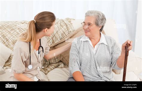 Nurse Talking With Her Patient Stock Photo Alamy