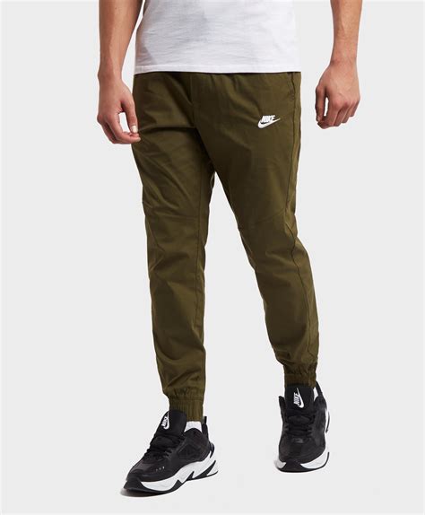 Nike Cotton Twill Cuffed Track Pants In Green For Men Lyst
