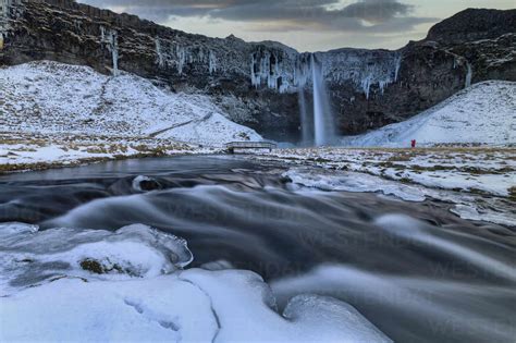 Iceland Long Exposure Of Seljalandsfoss In Winter Stock Photo
